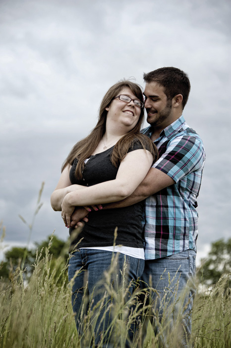 couple-in-field-for-engagement-photos