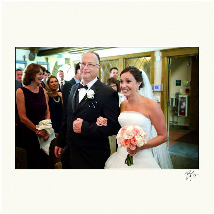 father-walking-daughter-down-aisle-our-lady-of-victory-church-ceremony