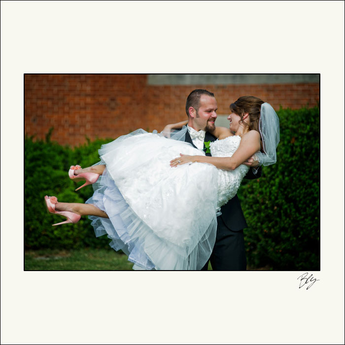 groom-carrying-bride-jeffrey-manion-columbus-bexley-ohio-bly-photography