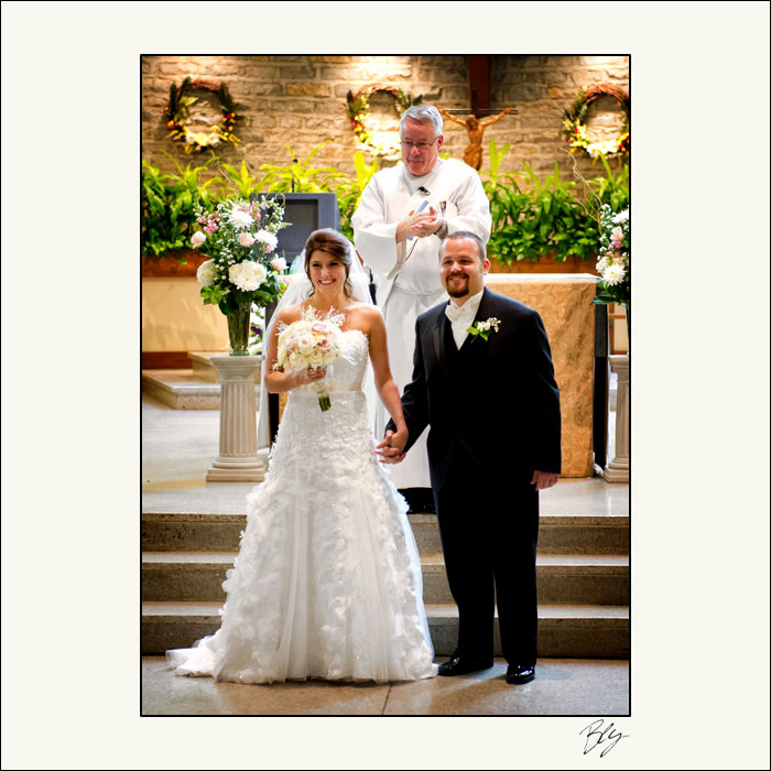 husband-and-wife-wedding-processional-st-brendan-church-hilliard-ohio