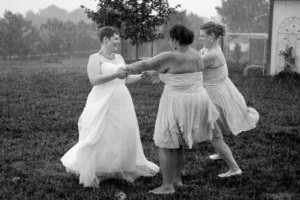 bride bridesmaids dancing rain marysville