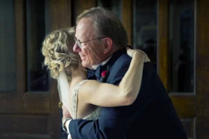 father daughter wedding hug