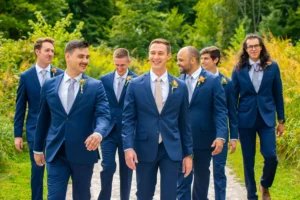 groomsmen walking outside columbus park