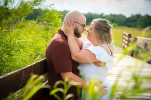 summer park engagement bridge portrait