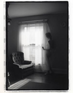 black-and-white-model-nude-in-window-columbus-ohio-photography.jpg